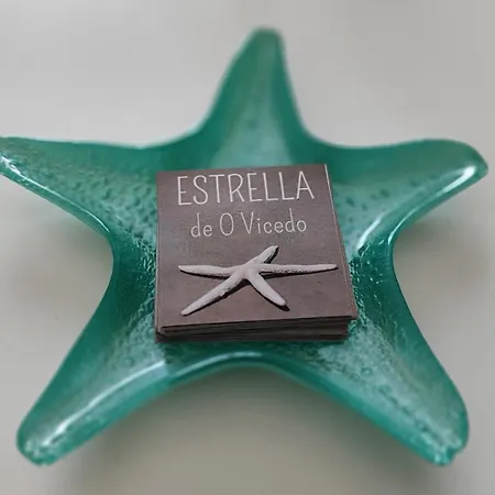 Estrella De *