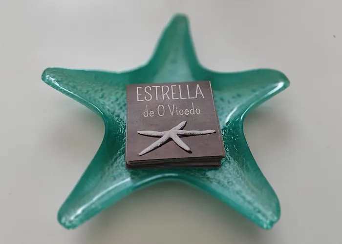 Estrella De *